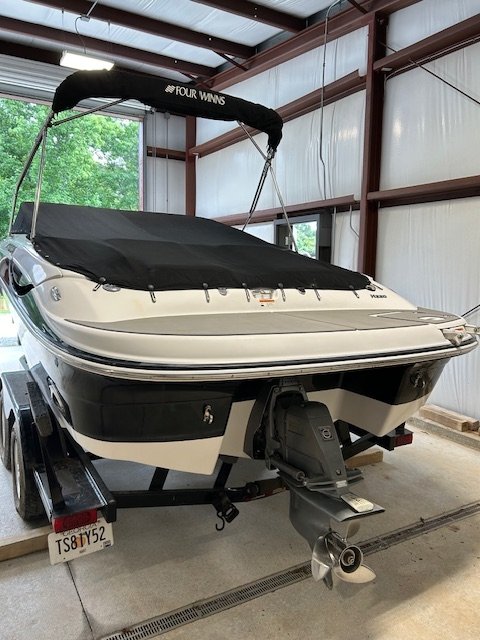 A bow rider is a boat with an open bow area where there are extra seats in front of the windshield.  Bow riders are typically between 17' and 30'long. They are well suited for many recreational water sports such as tubing, water skiing, and swimming.