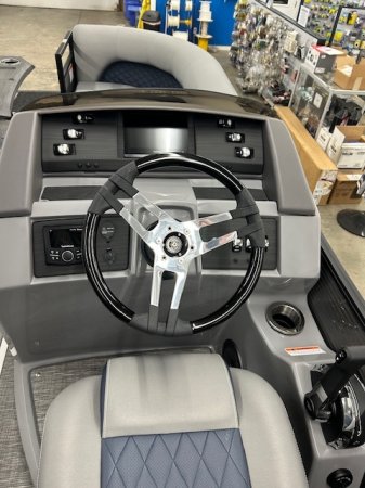 The definition of an outboard motor is a detachable engine mounted on outboard brackets on the stern of your boat.  This configuration will have only one single engine.