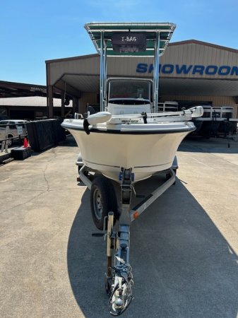 Center console is an open hull boat where the console of the boat is in the center. The boat deck surrounds the console so that a person can walk all around the boat from stern to bow with ease. Most center consoles are powered by outboard motors.